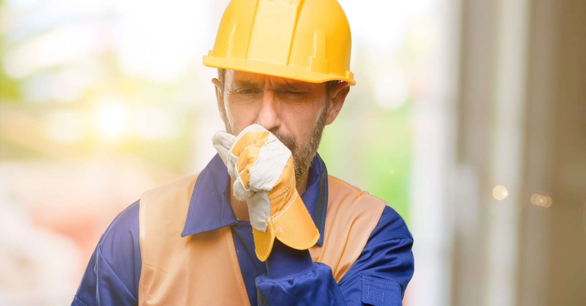 Senior engineer man, construction worker sick and coughing, suffering asthma or bronchitis, medicine concept